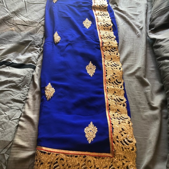 Beautiful royal blue and gold unstitched saree. - Picture 2 of 2